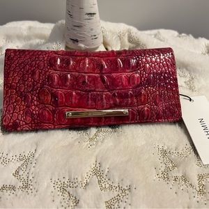 Gorgeous and elegant wallet by Brahmin in pomegranate color!